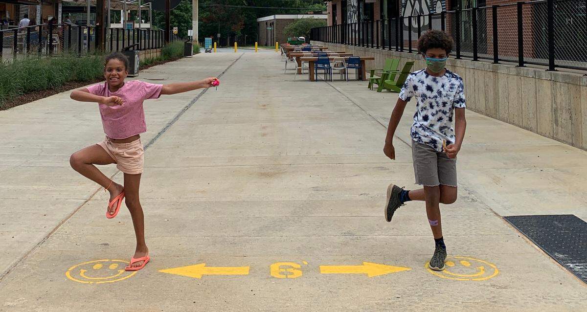 The Vallimont children, Rory and Holden, practice social distancing. 