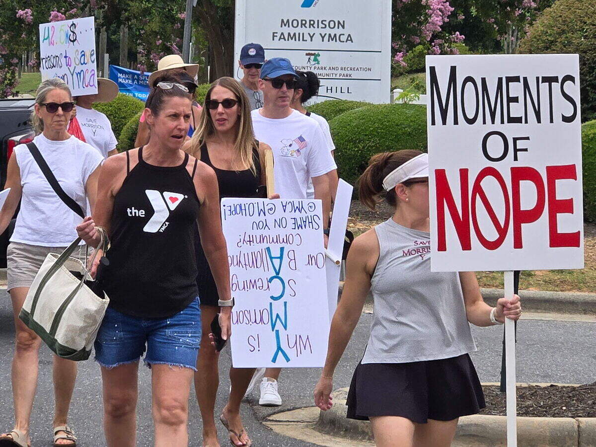 People arrive for a protest against the sale of the Morrison Family YMCA to a church in south Charlotte on Sunday, July 12, 2026.