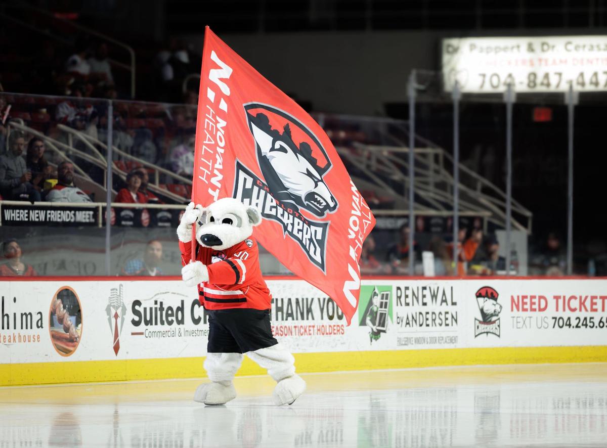 Chubby, the Charlotte Checkers’ mascot, skates across the Bojangles Coliseum ice after Friday’s third-round playoff win against the Hershey Bears.