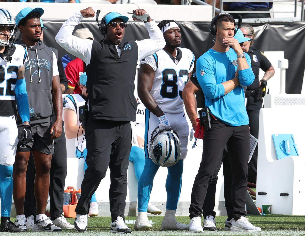 Carolina Panthers head coach Dave Canales, right,  watches the team battle the Jacksonville Jaguars on Sunday, September 7, 2025 at Everbank Stadium in Jacksonville, Florida. The Jaguars defeated the Panthers 26-10.