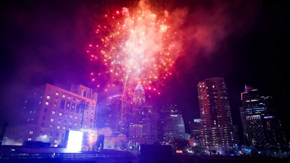 Fireworks illuminate uptown during the WBT SkyShow at Truist Field in Charlotte, N.C., July 4, 2022. Busy streets and intersections will be closed in uptown for the city’s “Stars and Stripes Spectacular” on Saturday, July 4, 2026, police said.