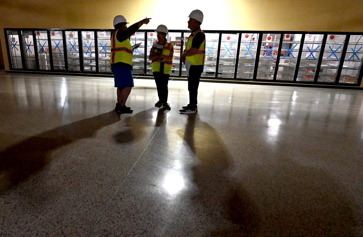Construction crews work Thursday, May 21, 2026, on the Wegmans grocery store in Ballantyne.