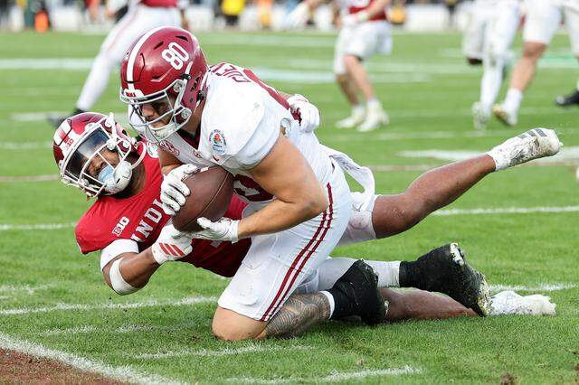 GettyImages-2254298047.jpg Alabama tight end Josh Cuevas runs with the ball while being tackled by Indiana defender Louis Moore during their College Football Playoff game on Jan. 1, 2026, at the Rose Bowl in Pasadena, California.
