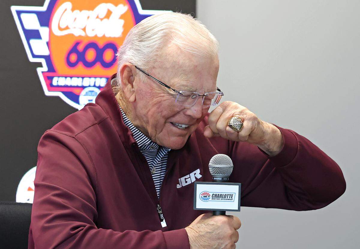 NASCAR Cup Series team owner Joe Gibbs imitates Kyle Busch’s wiping away fake tears after a win at Bristol Motor Speedway.