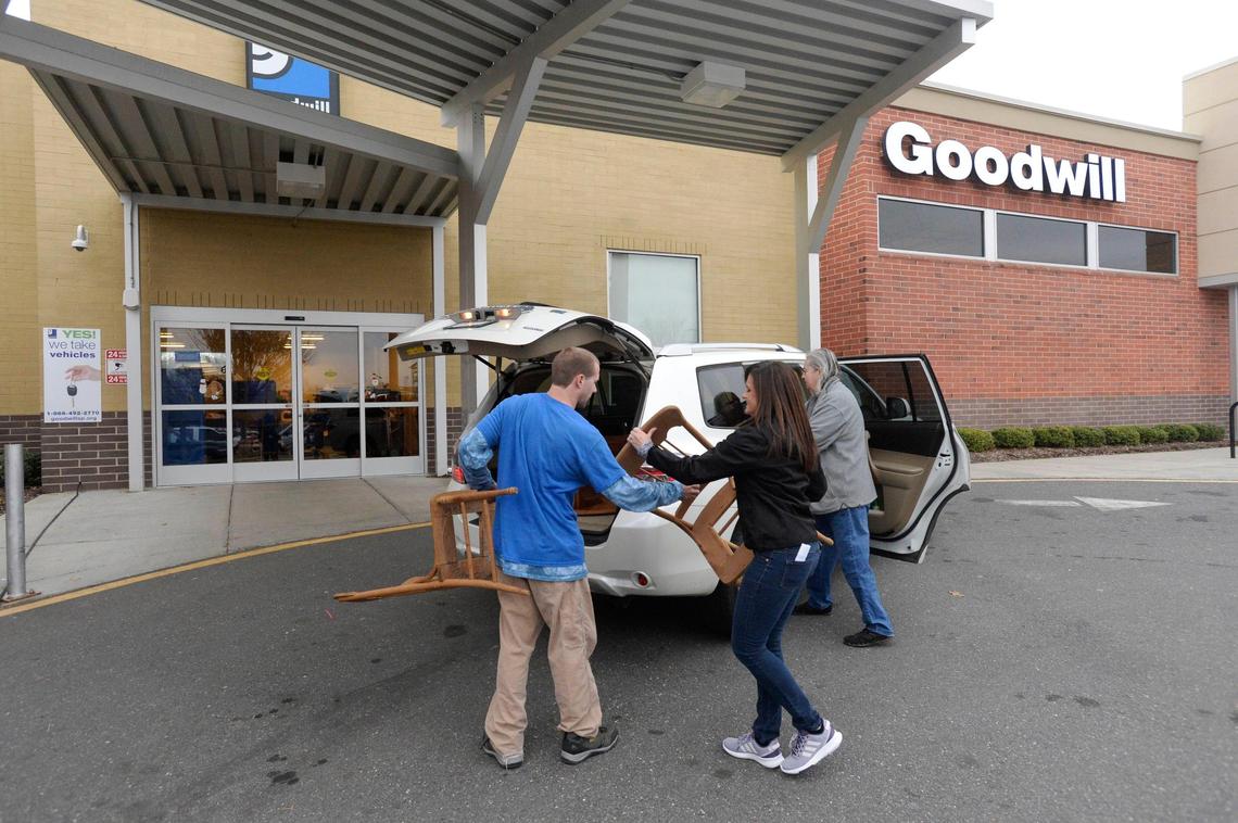 Original: Goodwill workers help unload a car with donations at the Goodwill Ballentyne store on Thursday, December 27, 2018. Officials with Goodwill Industries Of the Southern Piedmont has said that the new Trump administration tax laws have not resulted in a slowdown in year-end giving versus last years’ numbers.