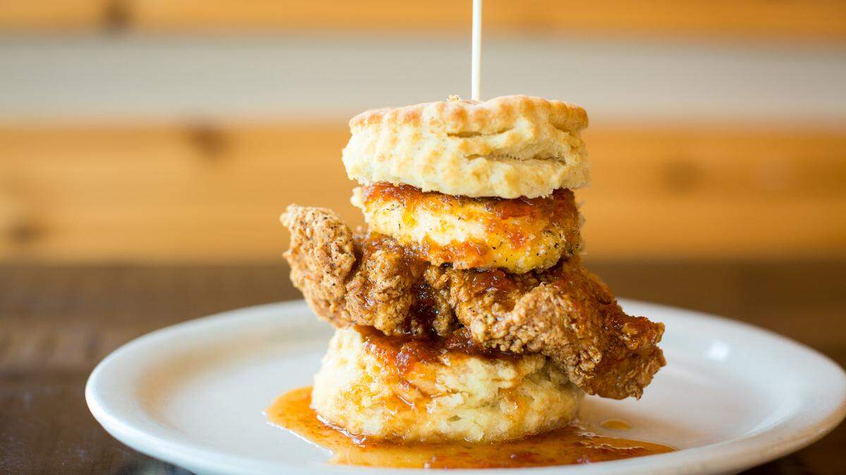 The Squawking Goat is a flaky biscuit with a fried goat cheese medallion on top of a chicken breast with house-made pepper jelly.