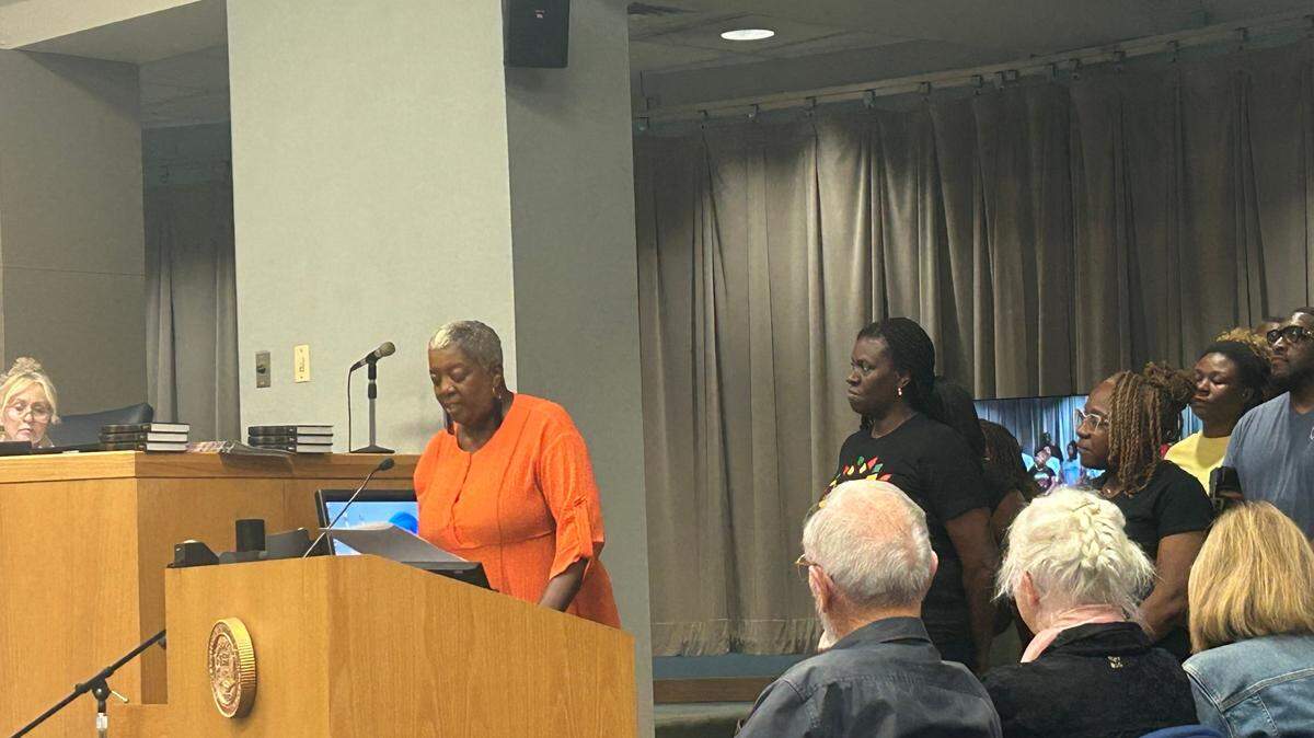 Councilwoman Cheryl Littlejohn (left) presents Tasha White (right), lead organizer of EbonyFest, with a city proclamation declaring June 19th as Juneteenth in the City of Gastonia.