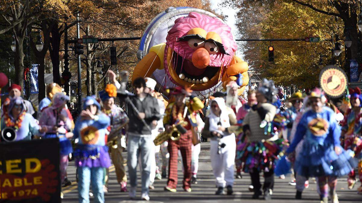 A 50-foot-long balloon replica of the character Animal floated by at the 72nd annual Novant Health Thanksgiving Day Parade in 2019.