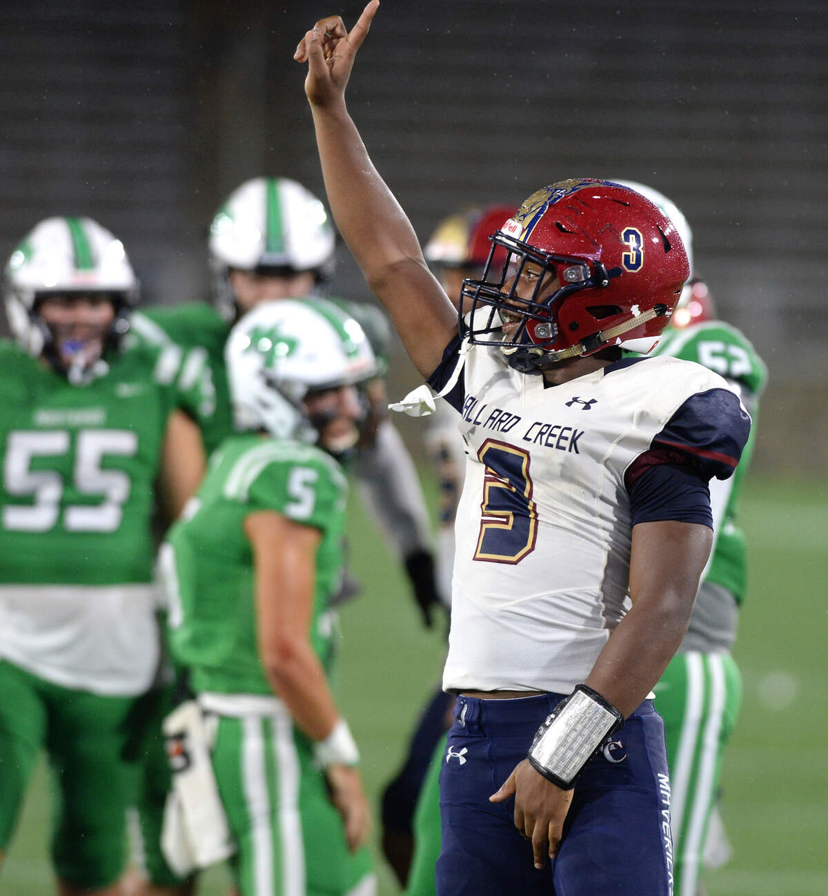 Mallard Creek Mavericks linebacker Tomar Bivens celebrates his tackle of Myers Park Mustangs quarterback Wendell Thompson on Thursday, August 18, 2022 at American Legion Memorial Stadium in Charlotte, NC.