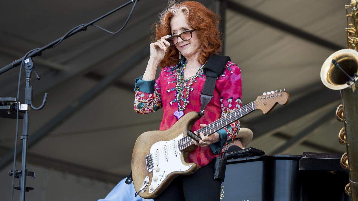 Bonnie Raitt performs during the Tribute to Fats Domino at the New Orleans Jazz and Heritage Festival last Saturday in New Orleans.