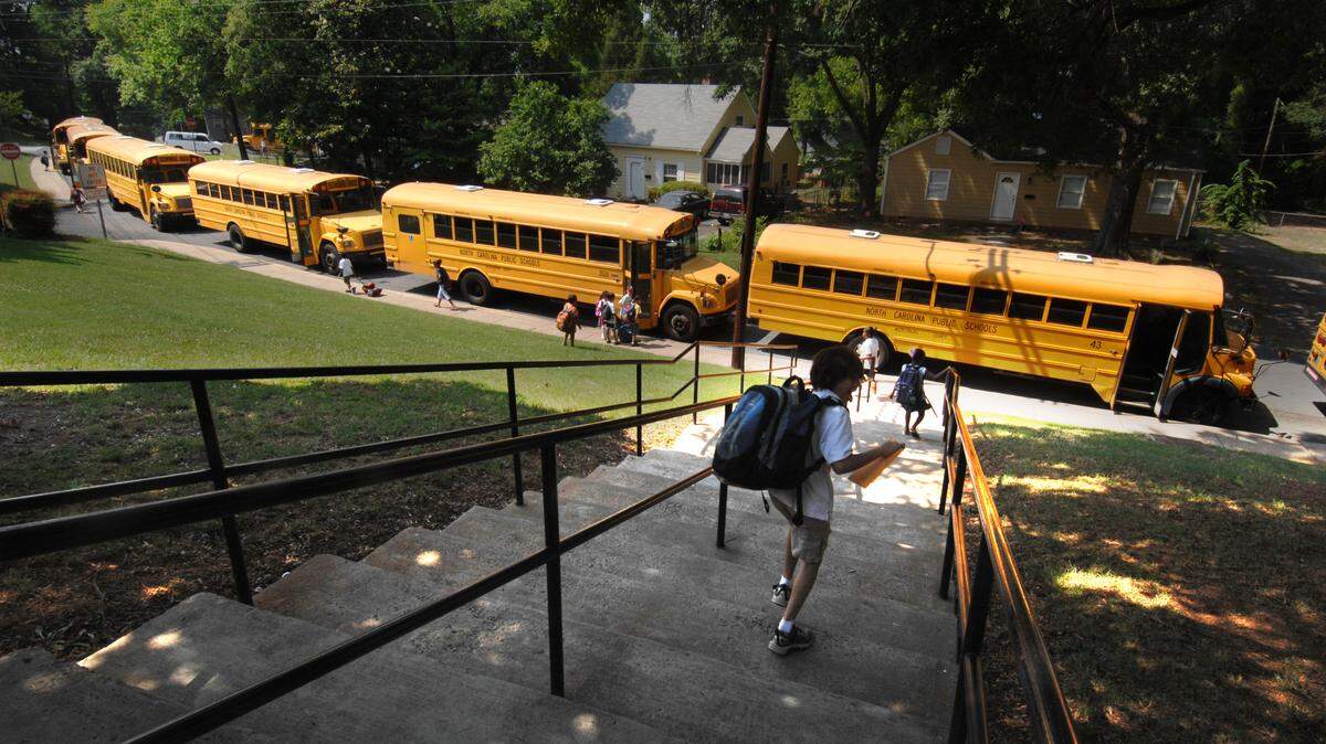 Charlotte-Mecklenburg Schools have seen a rise in weapons, including guns on campus in the 2021-22 school year. In this Observer file photo, a student leaves Villa Heights.