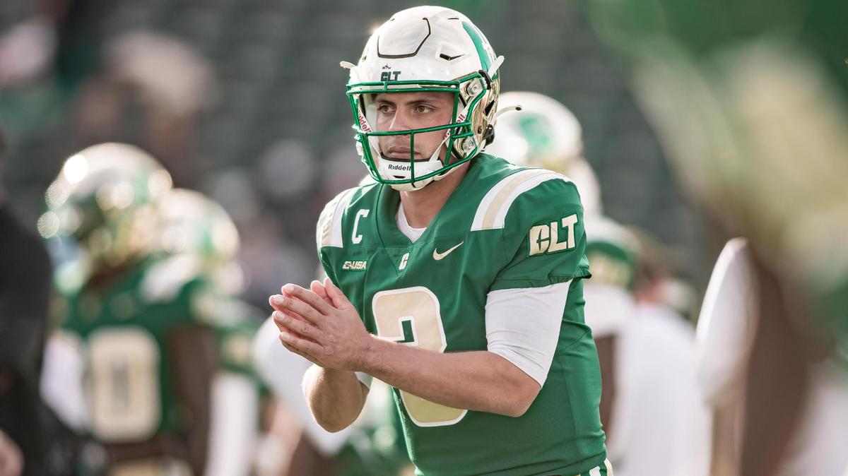 Charlotte’s Chris Reynolds (center) runs through pre-game warmups. Charlotte would host Marshall Saturday November 20, 2021.
