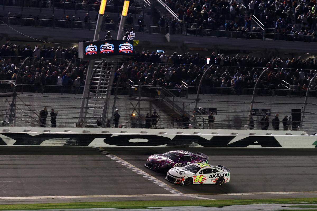 Feb 19, 2024; Daytona Beach, Florida, USA; NASCAR Cup Series driver William Byron (24) wins the Daytona 500 with driver Alex Bowman (48) finishing second at Daytona International Speedway. Mandatory Credit: Peter Casey-USA TODAY Sports