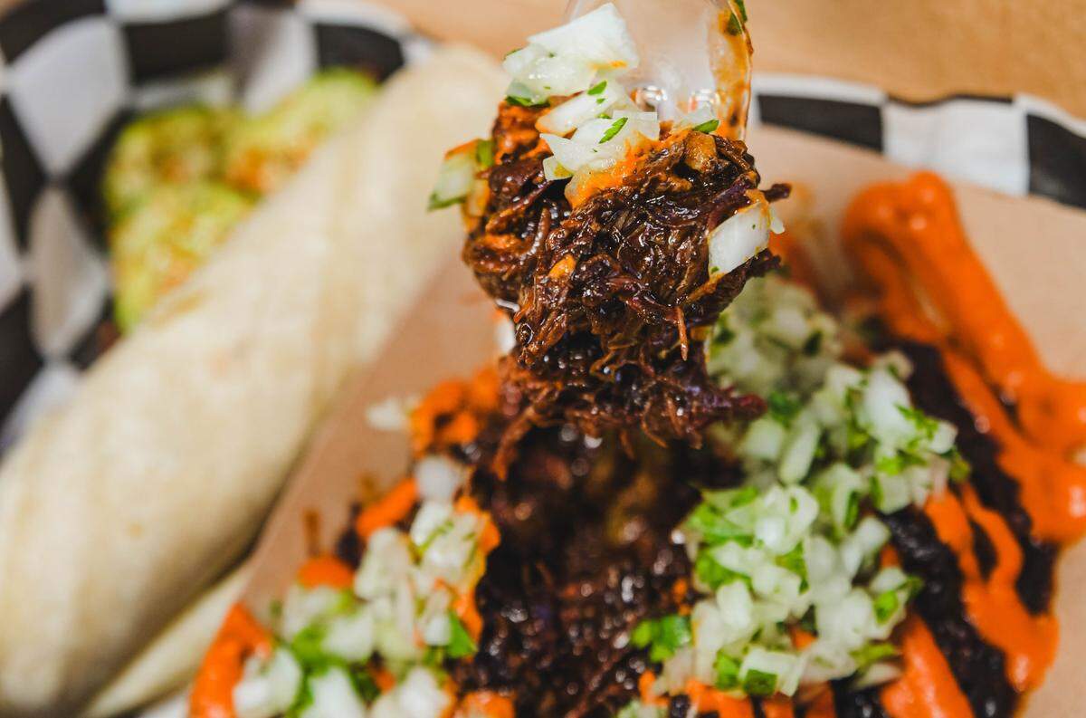 Beef cheek barbacoa with salsa taquera, onion, cilantro and lime.