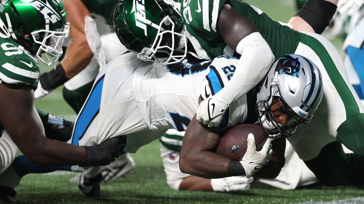 Carolina Panthers running back Dillon Johnson dives across the end zone for a touchdown on the final play of the game against the New York Jets on Saturday. The Jets defeated the Panthers 15-12, but the TD was Carolina’s first since Christmas Eve.