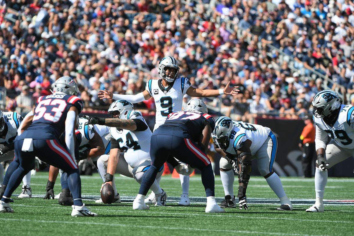 Carolina Panthers quarterback Bryce Young (9) directs the offense during Sunday’s first half at Gillette Stadium.