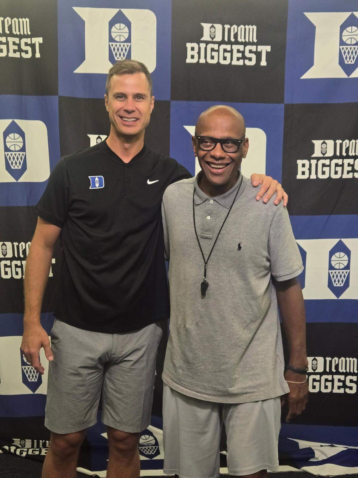 Former West Charlotte High coach Gosnell White and Duke men’s basketball coach Jon Scheyer at a summer camp in Durham.