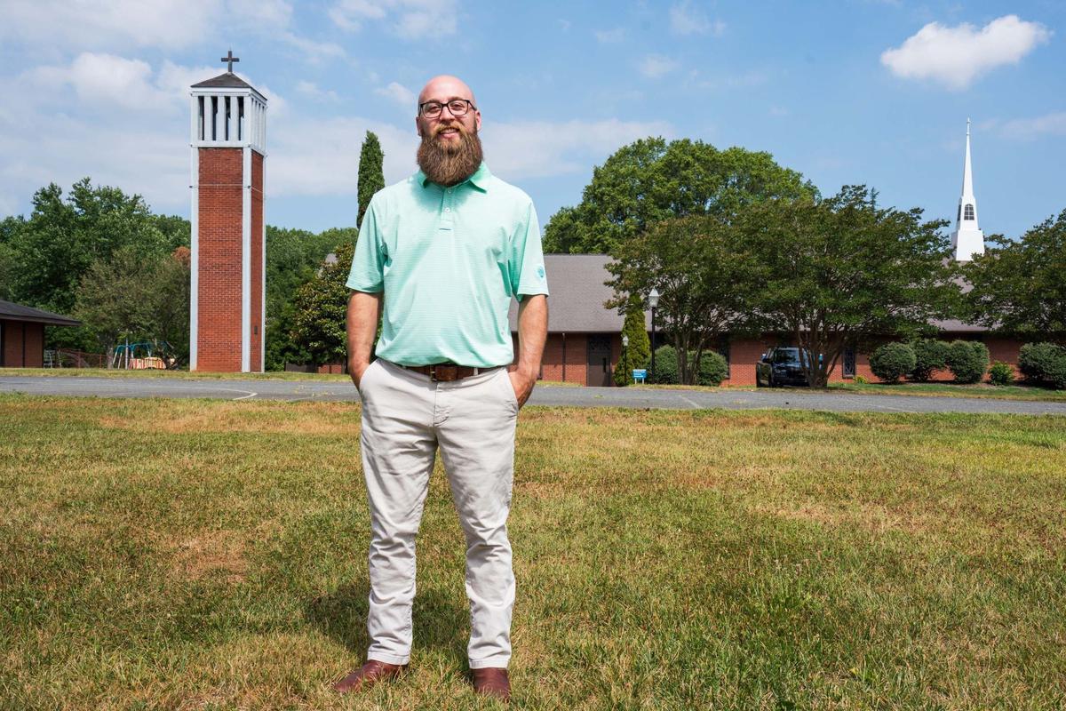 Pastor Matt Conner of Newell Presbyterian Church is at the 4.8 acres his church is selling to DreamKey to build affordable housing in the University City area of Charlotte, N.C. Conner expects to have houses built and residents living there by the end of 2026.