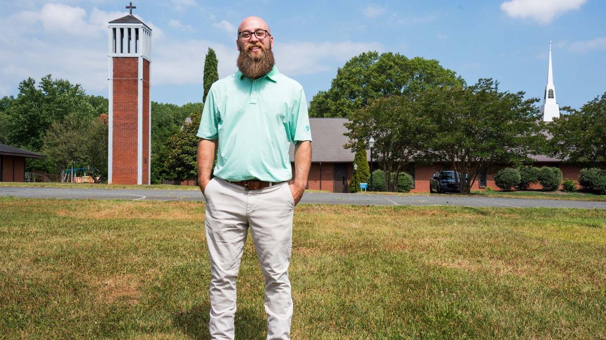 Pastor Matt Conner of Newell Presbyterian Church stands on the 4.8 acres his church is selling to DreamKey to build affordable housing in University City, Charlotte, N.C. Conner expects to have houses built and residents living there by the end of 2026.