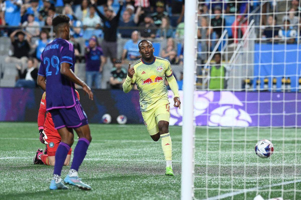 Mar 25, 2023; Charlotte, North Carolina, USA; New York Red Bulls attacker Elias Manoel (11) celebrates goal in the first half against Charlotte FC at Bank of America Stadium. Mandatory Credit: Griffin Zetterberg-USA TODAY Sports