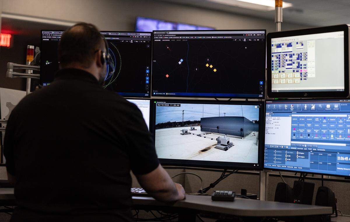 A dispatcher demonstrates sending out a drone during a media demonstration of the newly launched drone first responder program at Mooresville Police Department in Mooresville, N.C., on Wednesday, February 18, 2026.
