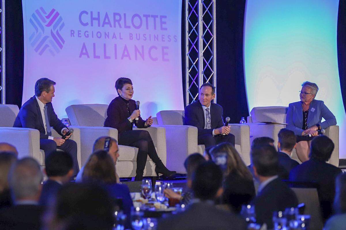 From left to right: Bank of America CEO Brian Moynihan, Duke Energy CEO Lynn Good, Sealed Air CEO Ted Doheny and former N.C. Commerce Secretary Sharon Decker discuss Charlotte’s economy during a conference Monday at the Westin uptown.