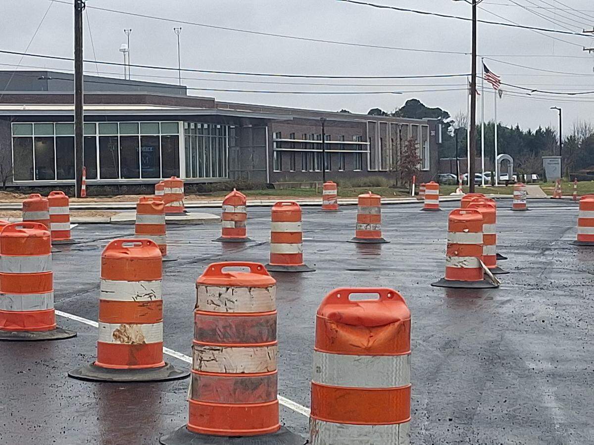 Barrels lined West Wilson Avenue, U.S. 21 and Brawley School Road after the intersection reopened on Monday after three months of improvements by Charlotte contractor Lane Construction Corp.