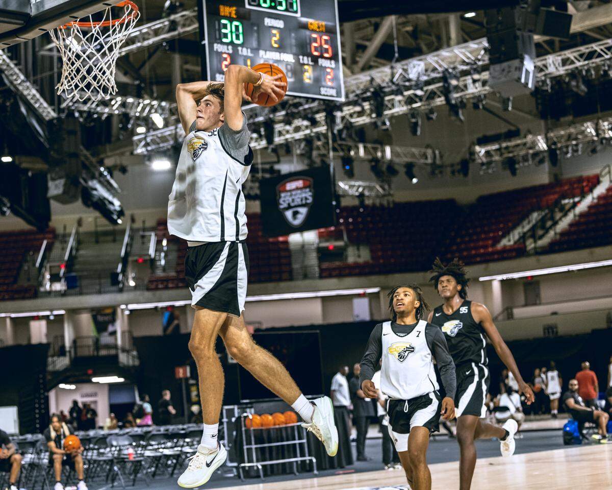 Duke’s Cooper Flagg dunks during a game at the Top 100 Camp for prep stars in 2023.