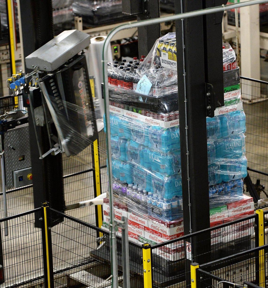 A machine completes the wrapping process in the automated warehouse before shipping. at Coca-Cola Consolidated.