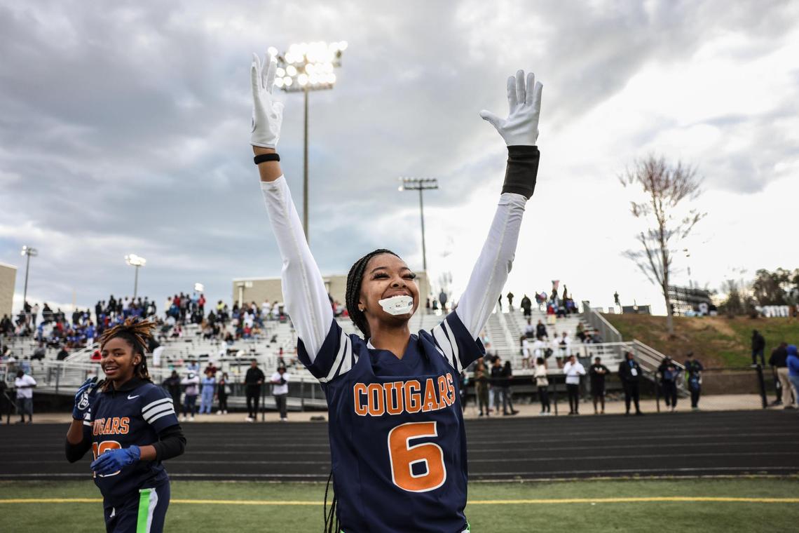 A Chambers player celebrates a touchdown against Hough at Hough High School in Cornelius, N.C., on Friday, March 25, 2022.