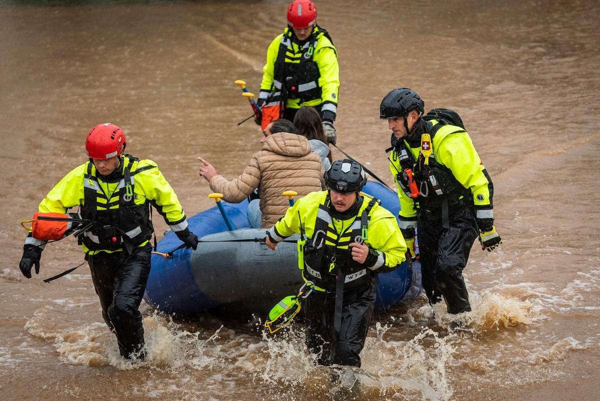 A NC State University study found that more than a million square miles of the United States are at risk of flood damage over a 14-year period. Here, firefighters with the Winston-Salem Fire Department evacuate residents at Creekwood Apartments as flood waters rise on Thursday, Nov. 12, 2020 in Winston-Salem, N.C.