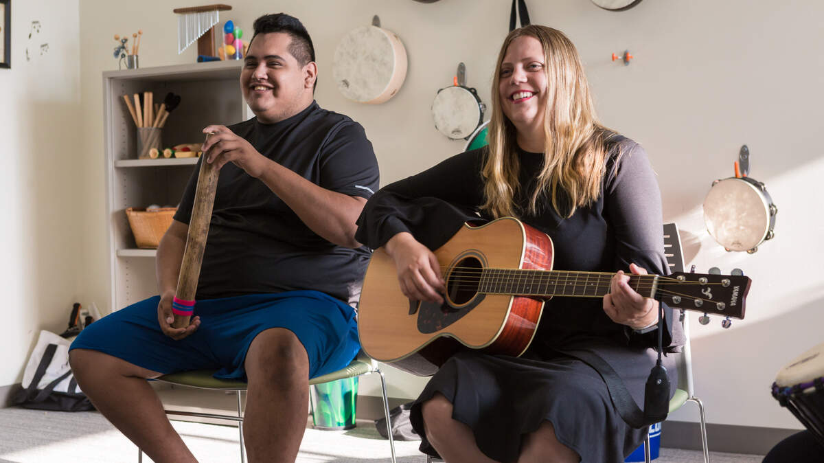 Music therapist Joan Kleinmann, right, helps HopeWay residents use music to foster hope, increase self-esteem, regulate emotions and express themselves.