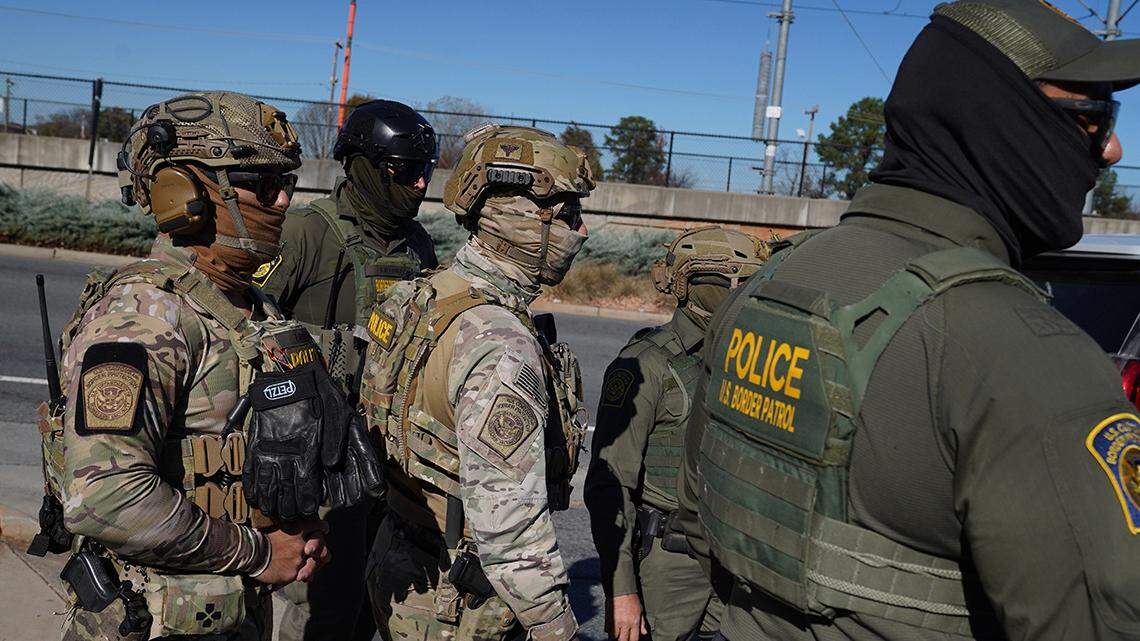 CHARLOTTE, NORTH CAROLINA - NOVEMBER 17: Federal agents search for undocumented immigrants on November 17, 2025 in Charlotte, North Carolina. Federal agents are carrying out “Operation Charlotte’s Web,” an ongoing immigration enforcement surge across the Charlotte region. (Photo by Ryan Murphy/Getty Images)