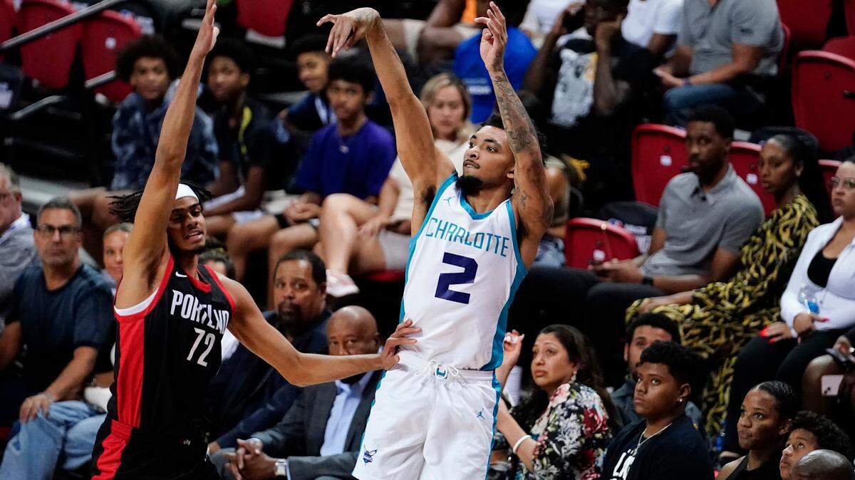 Charlotte Hornets guard James Bouknight (2) shoots against Portland Trail Blazers guard/forward Rayan Rupert (72) during the first half at Thomas & Mack Center.