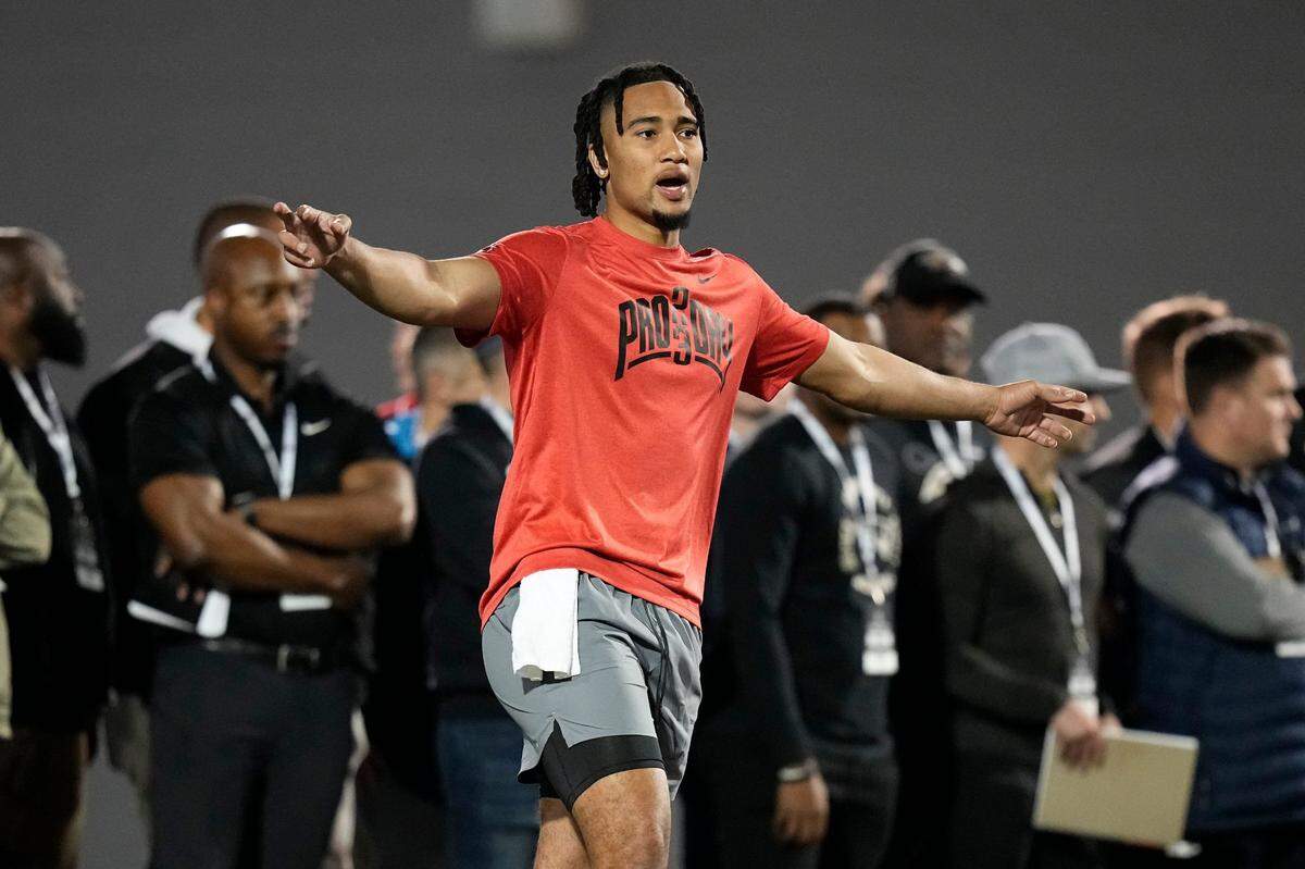 Ohio State Buckeyes quarterback C.J. Stroud lines up his wide receivers while throwing during Ohio State footballâ??s pro day at the Woody Hayes Athletic Center in Columbus on March 22, 2023. Football Ceb Osufb Pro Day