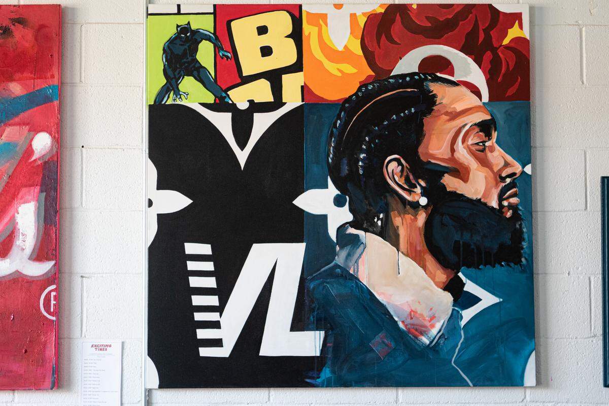 The pieces in Dammit Wesley’s “Exciting Times” exhibit deal with “consumerism and blackness,” he said.