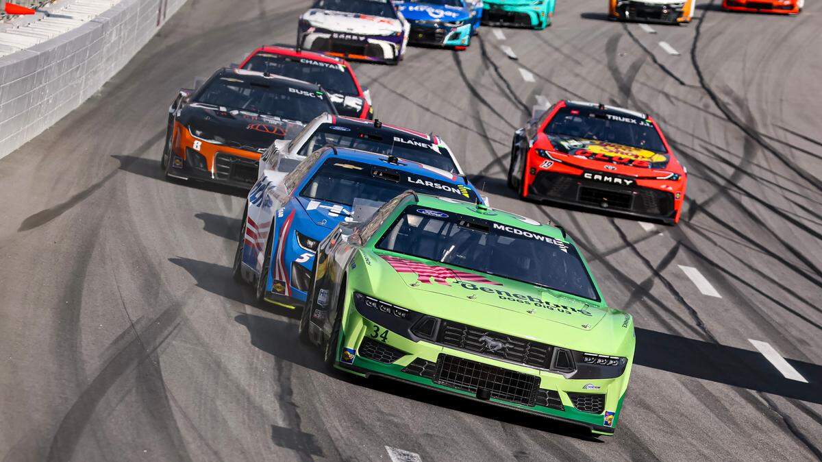 Michael McDowell (34) battles with Kyle Larson (5) during the NASCAR Cup Series’ Ambetter Health 400 at Atlanta Motor Speedway on Sunday. 