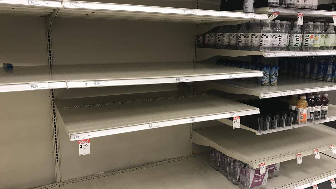 Shelves of bottled water at the Target in Midtown in Charlotte were heavily picked over Tuesday morning as shoppers prepare for Hurricane Florence.