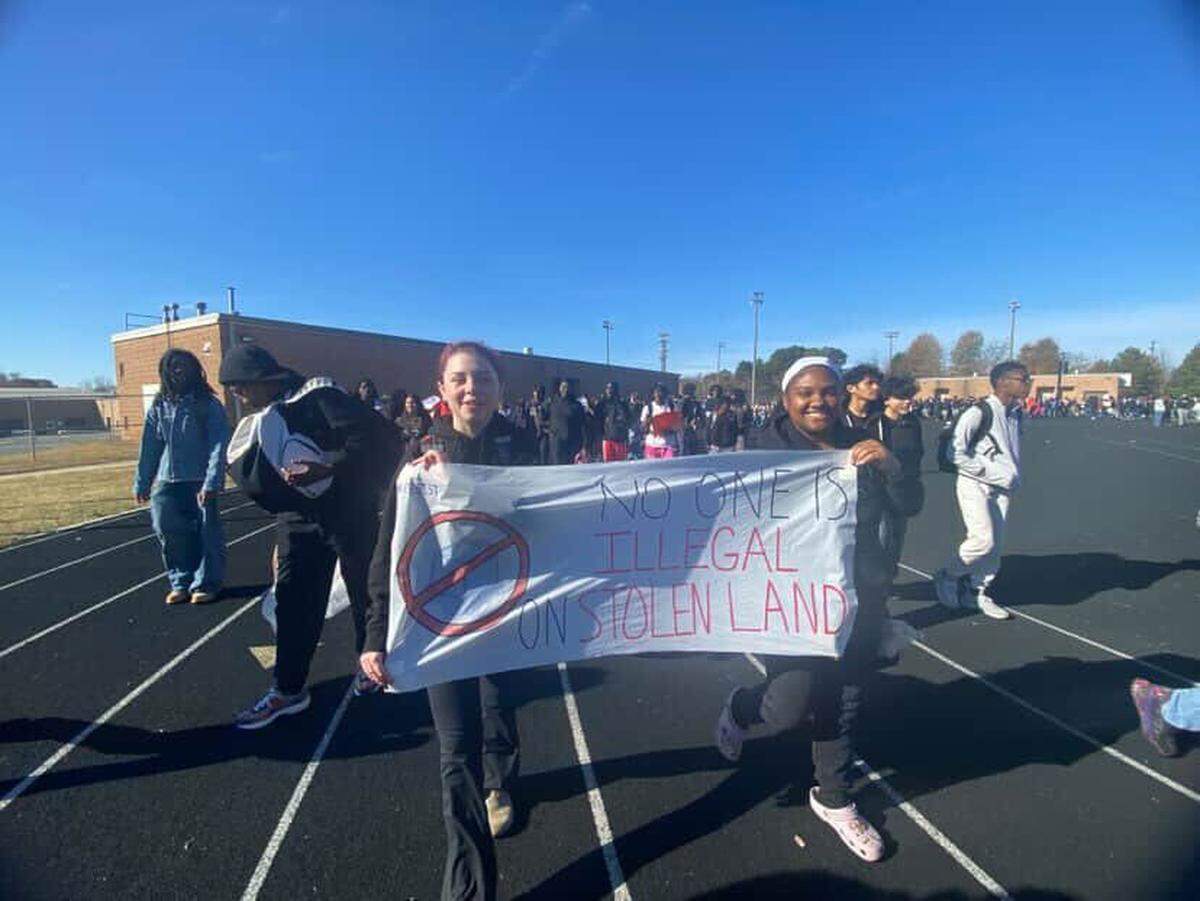 Phillip O. Berry Academy of Technology students in west Charlotte protested ICE and Border Patrol Tuesday morning with signs and flags.