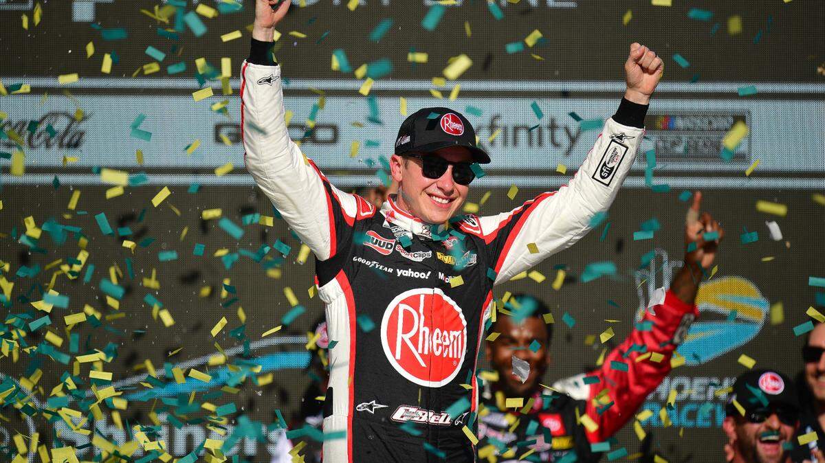 Christopher Bell celebrates his NASCAR Cup Series victory at the Shriners Childrens 500 at Phoenix Raceway in Avondale, Ariz., on March 10, 2024.