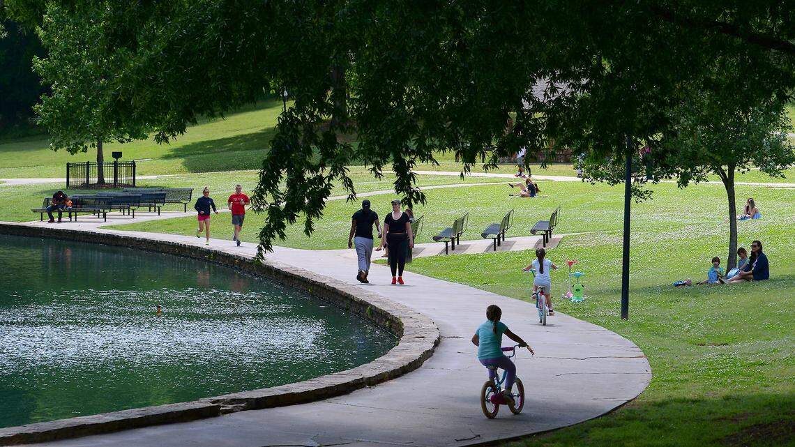 People enjoy activities at Freedom Park in Charlotte on Wednesday, May 6, 2020.