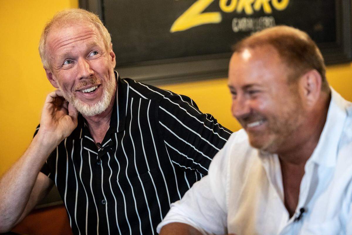 David “Ace” Cannon, left, and Ritchie “TJ” Beams share a laugh during an interview with The Charlotte Observer in 2021.