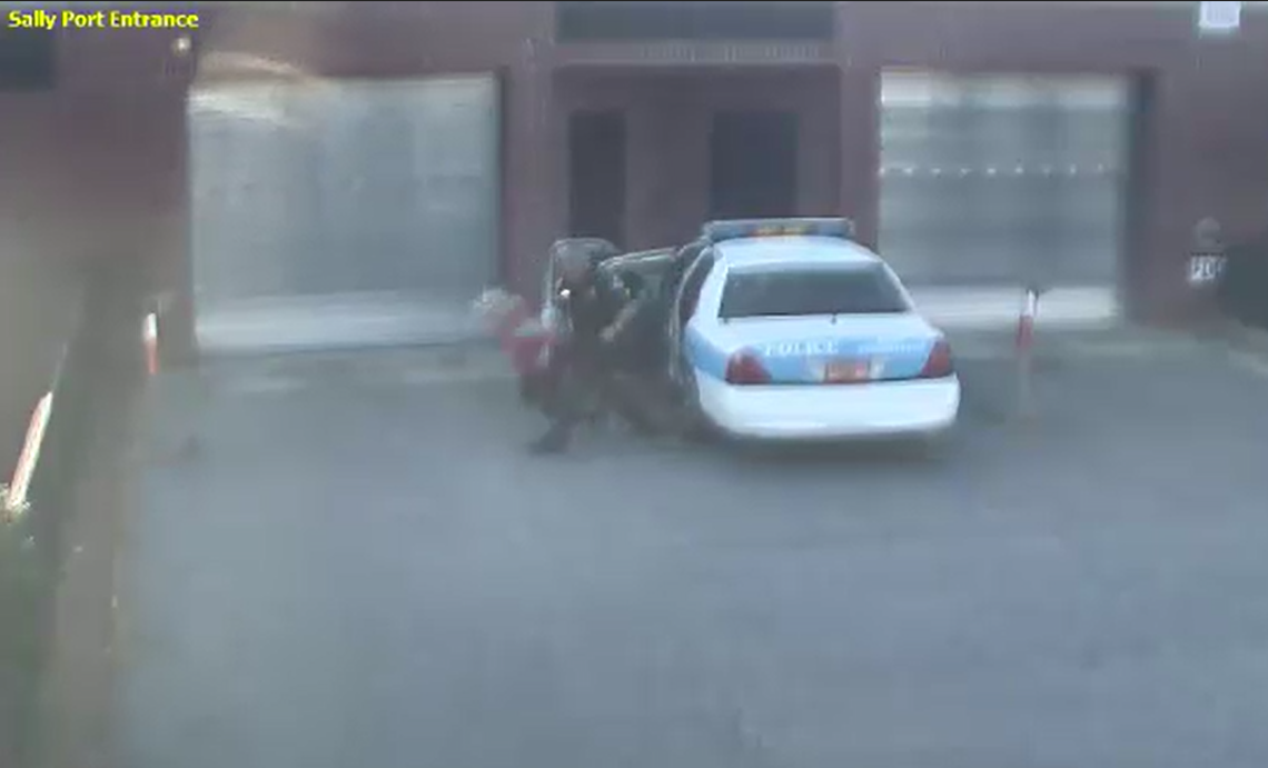 In this Hickory Police surveillance video, now-former Sgt. Robert George slams a handcuffed Chelsea Doolittle outside the station in 2013. George was convicted and sentenced to four year’ probation in 2019. A federal appeals court overturned that sentence in 2022.