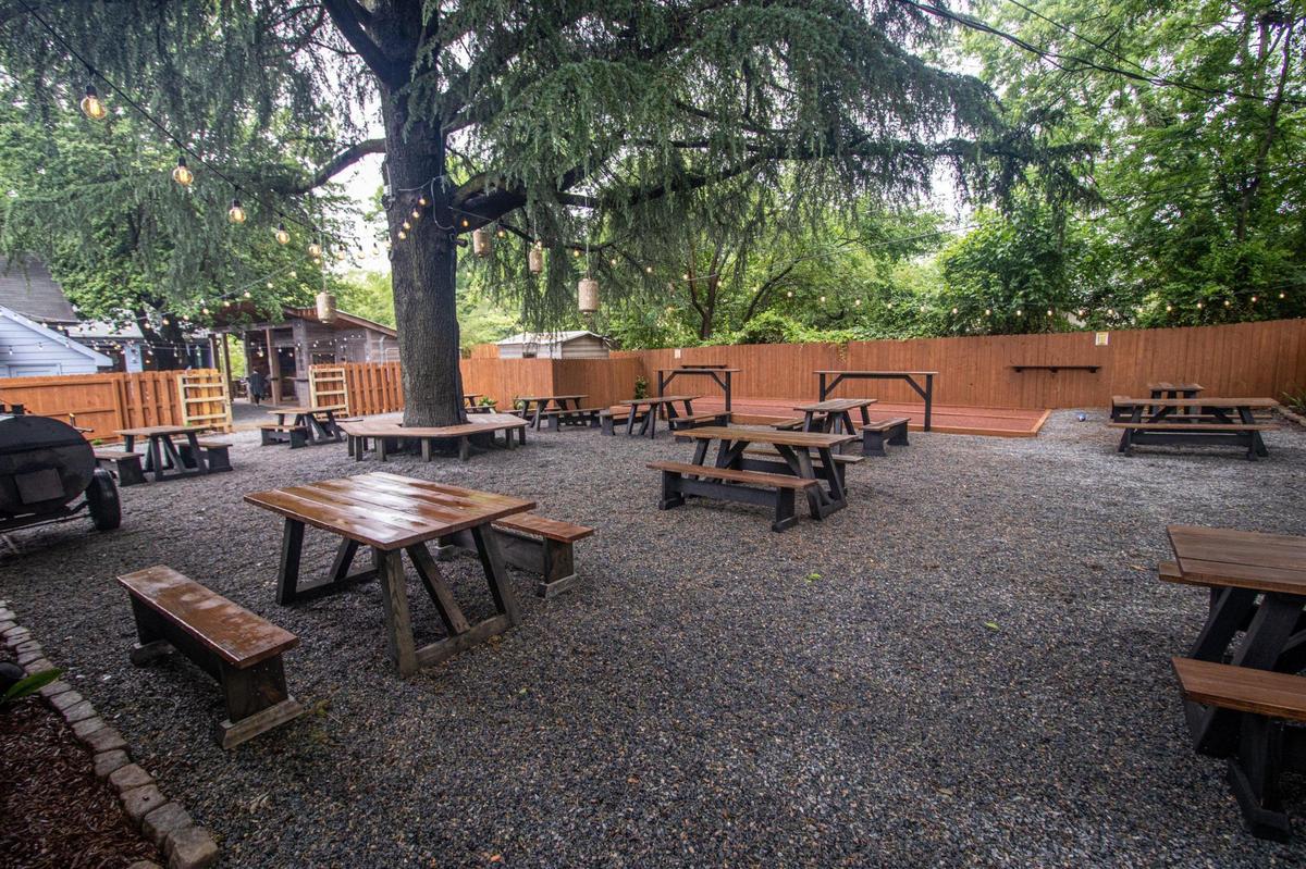 The patio at Goodyear House in NoDa extends into the backyard lot next door to encourage people to space out during COVID-19.