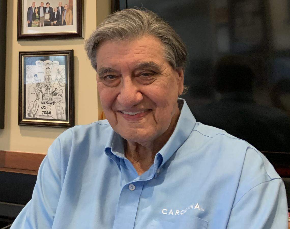 Lennie Rosenbluth, the star of UNC’s 1957 basketball team, poses for a photo at his home in Chapel Hill. Now 87, Rosenbluth was the national player of the year for the Tar Heels’ 32-0 team, which edged Kansas and Wilt Chamberlain in triple overtime in the national final.