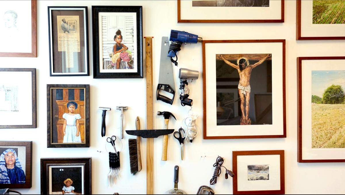 Every inch of Tommie Robinson’s studio wall is filled with tools and his artwork.  Examples from his 50-year career are seen across Charlotte, from his 24-foot murals in the Spectrum Center to triptychs at Friendship Missionary Baptist Church casting parishioners in scenes from the Gospels..