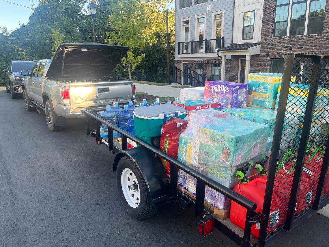 Porter Watson, Shane Shields and friends gather supplies in Charlotte to bring back to Western North Carolina.