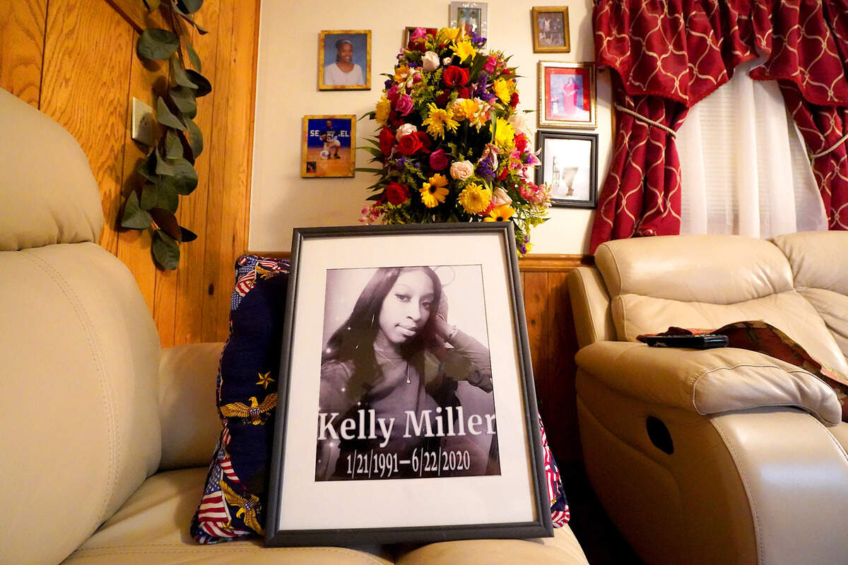 A framed photograph of Kelly Miller was given to her mother Gwendolyn and father, James Miller following her death. Kelly Miller was hit by a bullet and run over by a car during a street party on Beatties Ford Road in Charlotte, NC. At least 11 other people were injured by either gunshot or being hit by cars during the melee. 