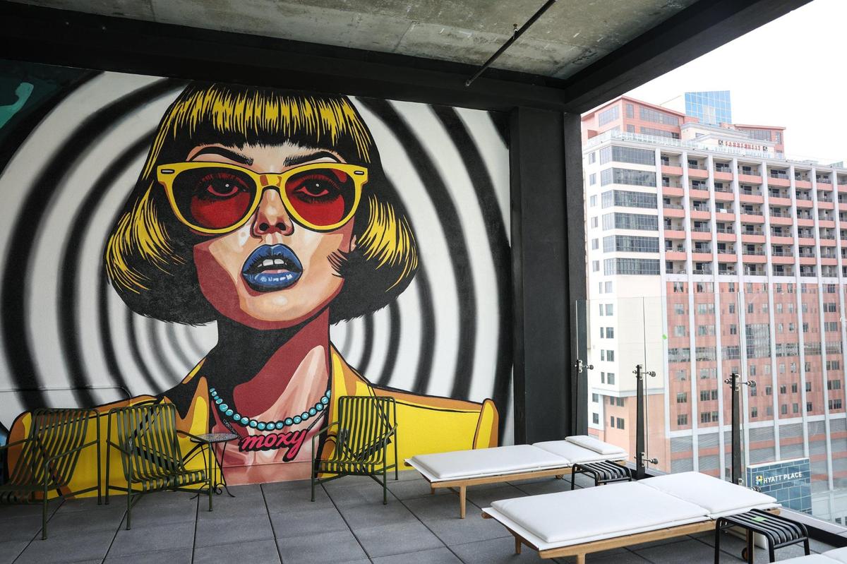 Colorful murals are an intentional design element of the Moxy Charlotte Downtown. This mural can be seen on the deck of the 13th floor lobby, where guests can check-in, enjoy a cocktail and view the city’s skyline.