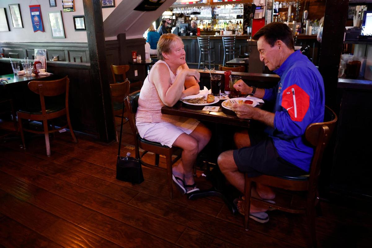 Vickey Black, left, and Fran Black, of Jacksonville, Fla., grabbing lunch at the French Quarter recently. The couple were in Charlotte for their son’s wedding.